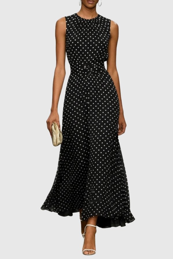 Stylish women's summer maxi dress, polka dot pattern & elegant ruffle hem for cocktail parties.