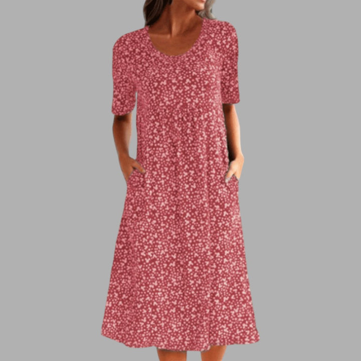 Stylish women's printed midi dress with a unique pattern. Chic for casual or party wear, flattering silhouette.