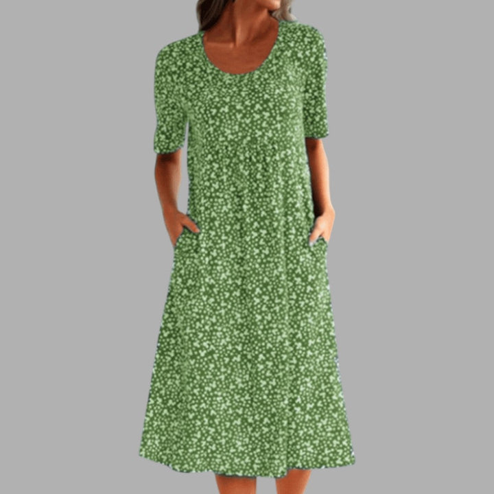 Flattering women's printed midi dress, elegant and chic. Ideal for spring fashion, regular fit.