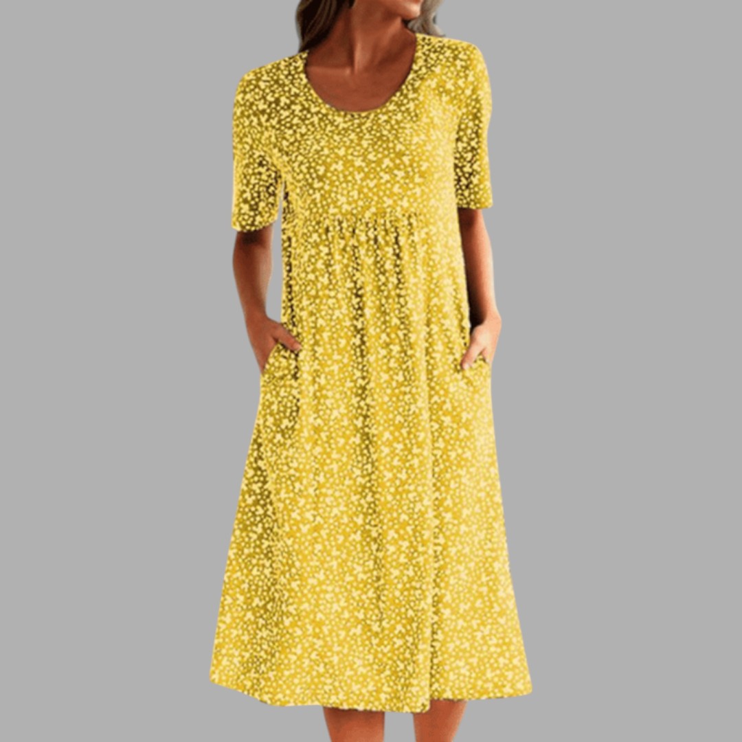 Vibrant patterned women's midi dress, elegant and stylish. Perfect for spring/summer fashion.