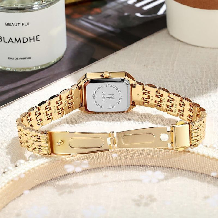 Women's elegant gold-tone rectangular watch, a timeless accessory for any fashion-conscious individual.
