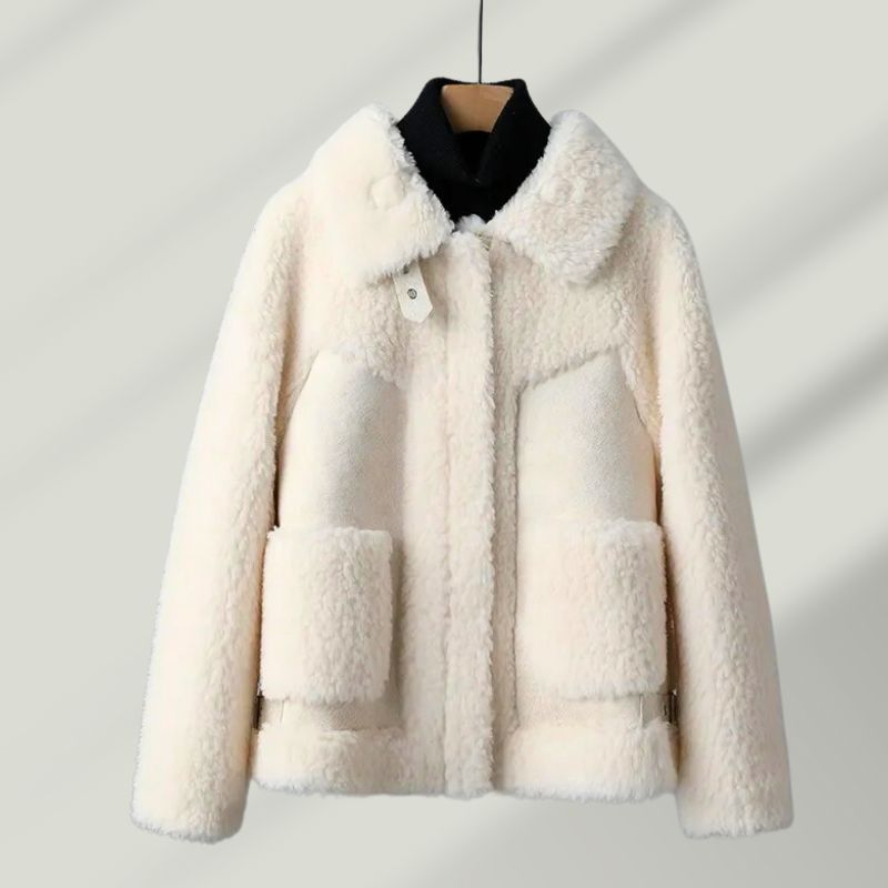 Detail of the sherpa lining inside a women's Renard wool blend winter coat, emphasizing warmth