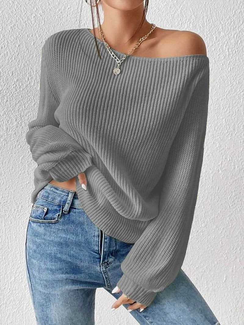 Stylish women's off-shoulder sweater, showcasing the flattering neckline and comfortable knitwear design.