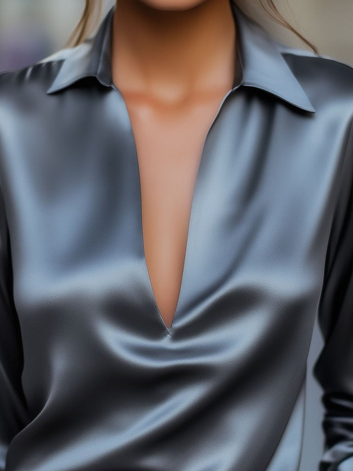 Chic women's long sleeve satin blouse with a sophisticated V-neckline, ideal for summer evenings.