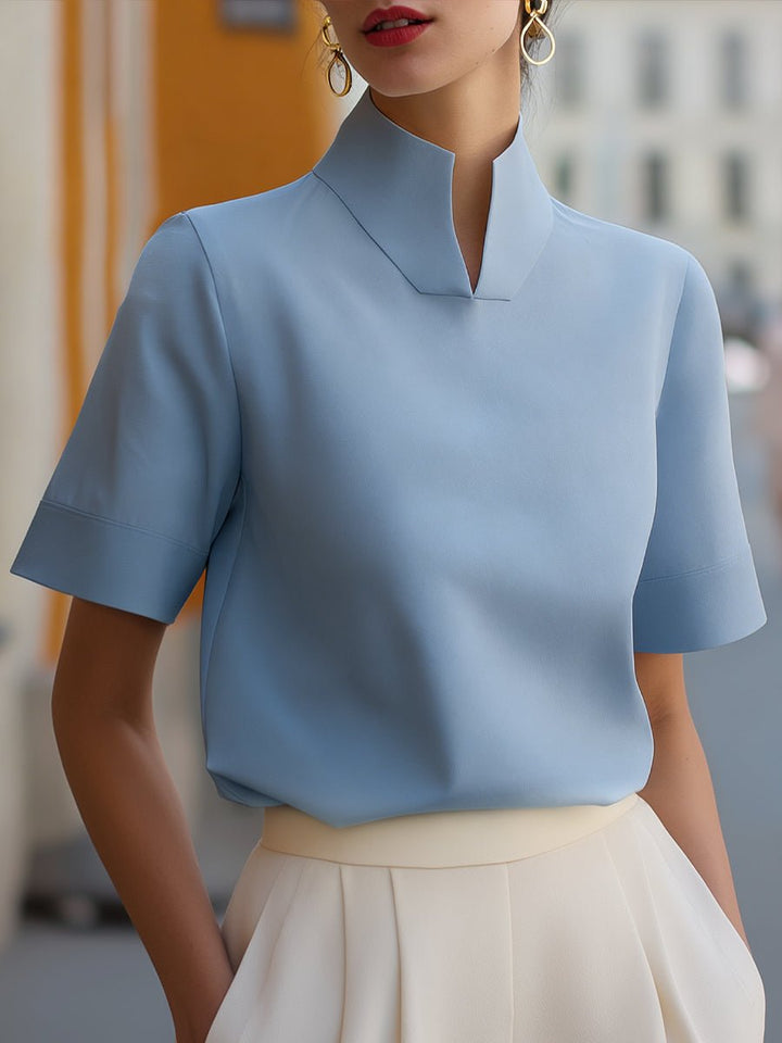 Versatile women's elegant mandarin collar blouse. Short sleeve, relaxed fit for office, work, or casual chic.