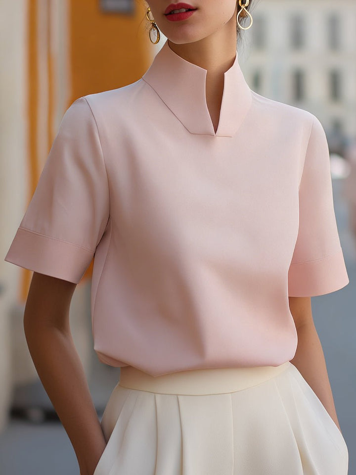 Fashionable women's short sleeve mandarin collar blouse. Elegant spring/summer top for office & casual wear.