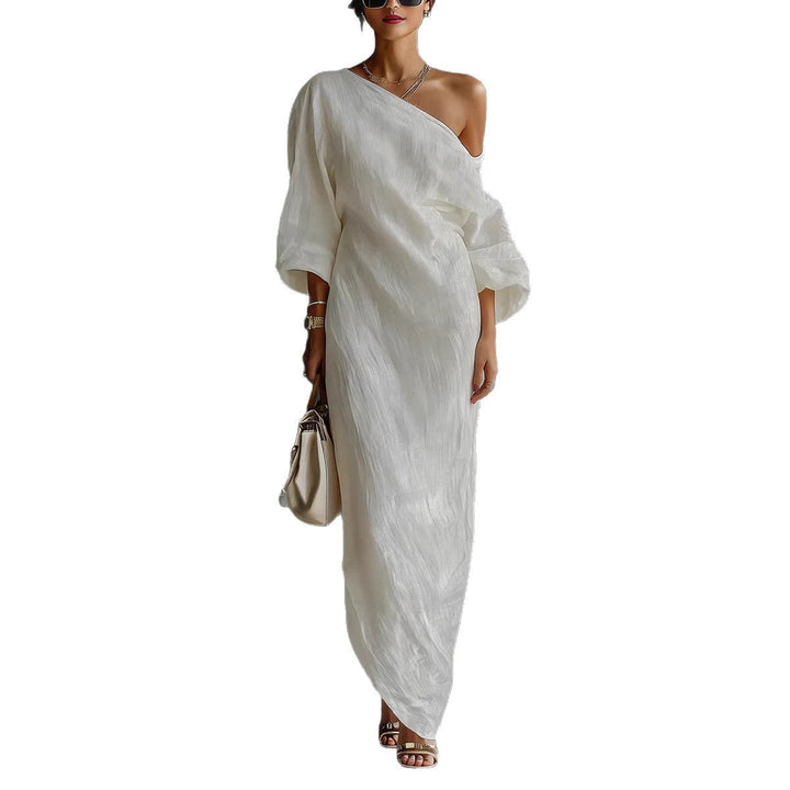 Comfortable flowy women's maxi dress. Elegant slanted neck and stylish lantern sleeves for everyday wear.