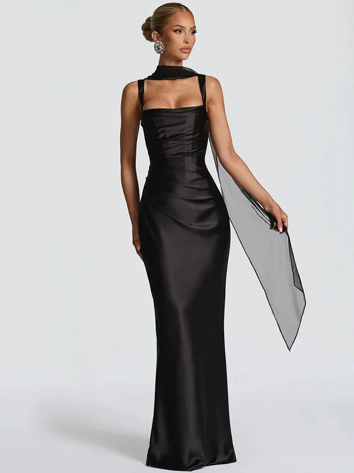 Formal women's evening wear: an elegant sleeveless maxi gown for weddings and special events.