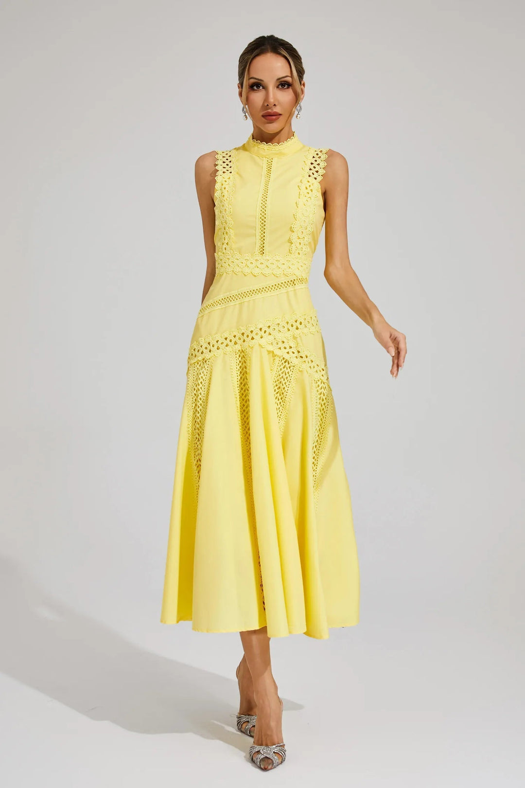 Elegant women's sleeveless midi dress with delicate lace panels, perfect for summer parties & special occasions.