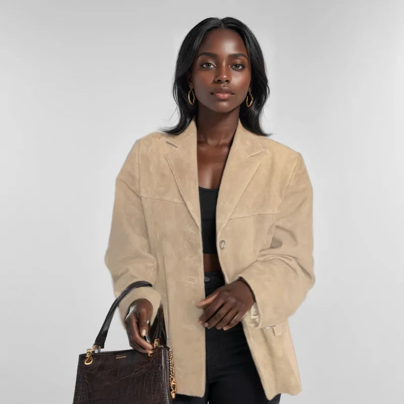 Women's sleek suede blazer jacket, ideal for workwear, adding sophistication to any ensemble.
