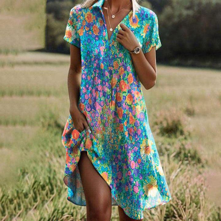 Elegant women's summer floral V-neck midi dress with short sleeves, perfect for casual spring fashion or vacation.