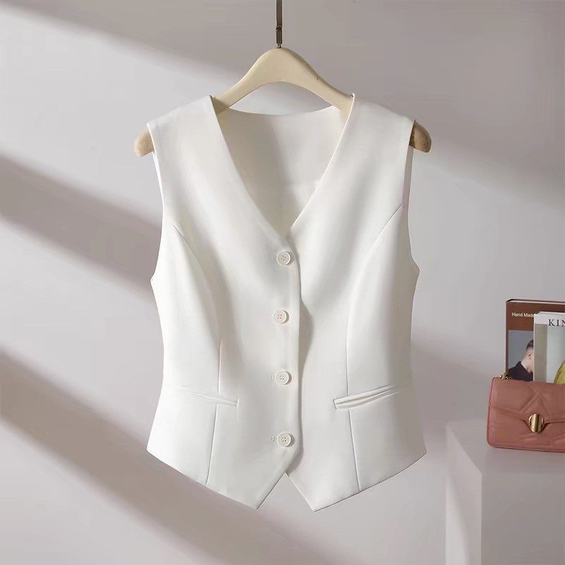 Minimalist women's tailored V-neck vest, a versatile sleeveless top for casual chic outfits.