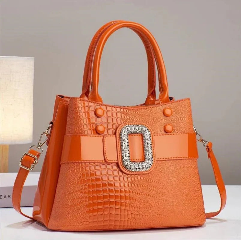 Versatile textured lizard leather shoulder bag for women, featuring a sophisticated design.