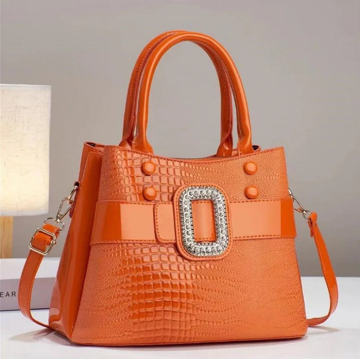 Versatile textured lizard leather shoulder bag for women, featuring a sophisticated design.