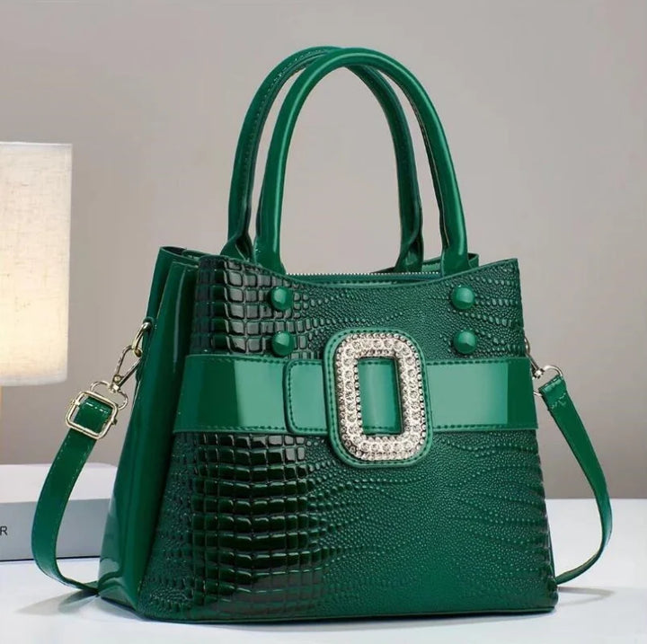 Fashionable women's lizard leather shoulder bag, an elegant and versatile accessory.