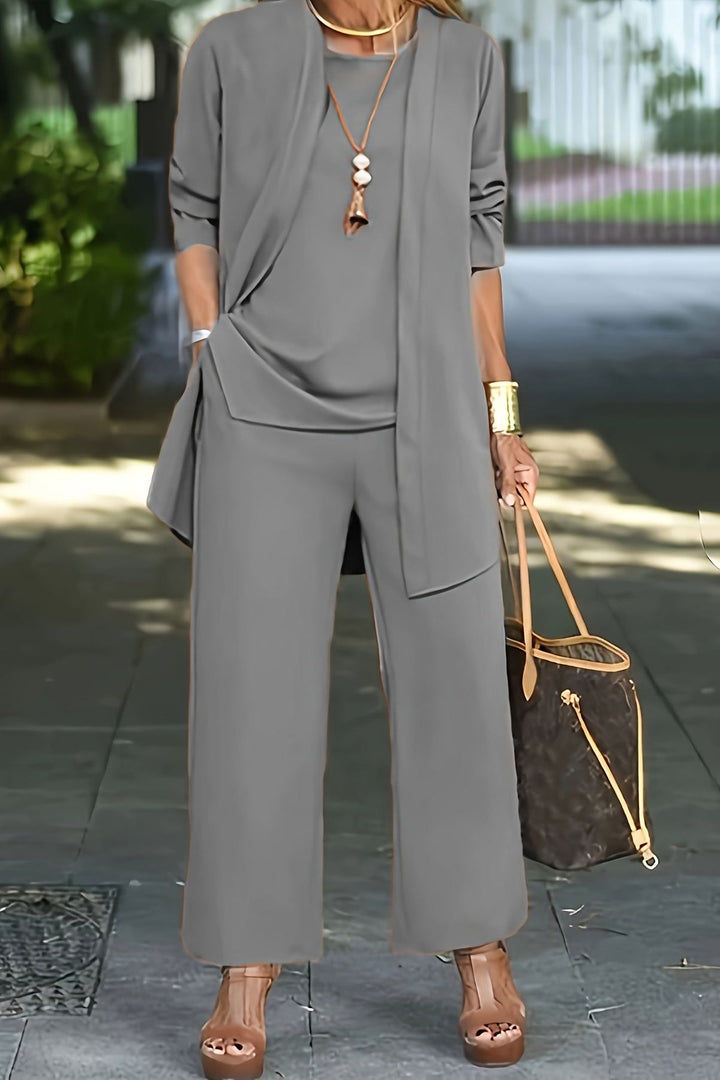 Sophisticated women's three-piece set, ideal for elegant office wear or casual chic outings.