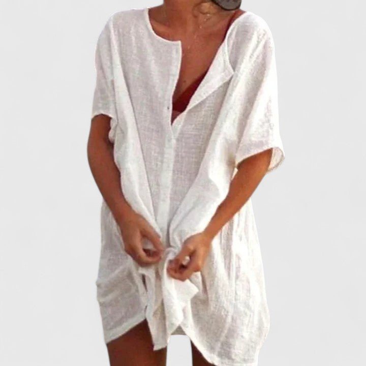 Elegant women's tunic dress, lightweight summer style. Perfect for beachwear or casual day-to-night fashion.