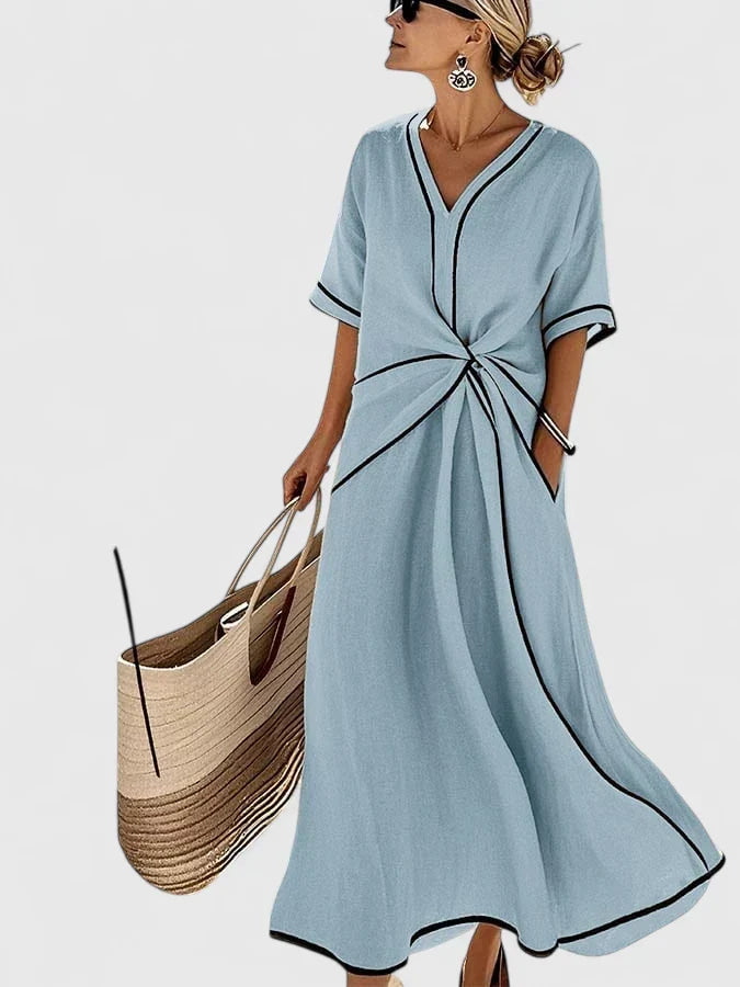 Casual chic women's A-line maxi dress, perfect for summer vacation wear. Features a stylish twist front V-neck.