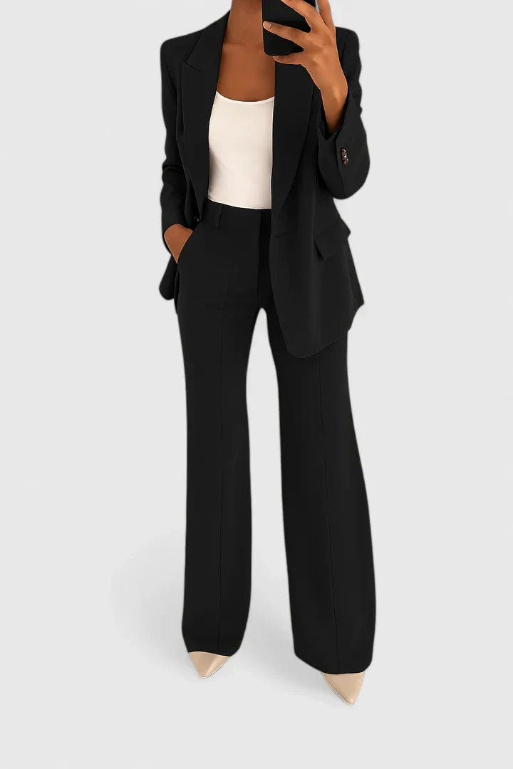 Elegant women's two-piece suit set in a classic style, perfect for business, office wear, or formal occasions.