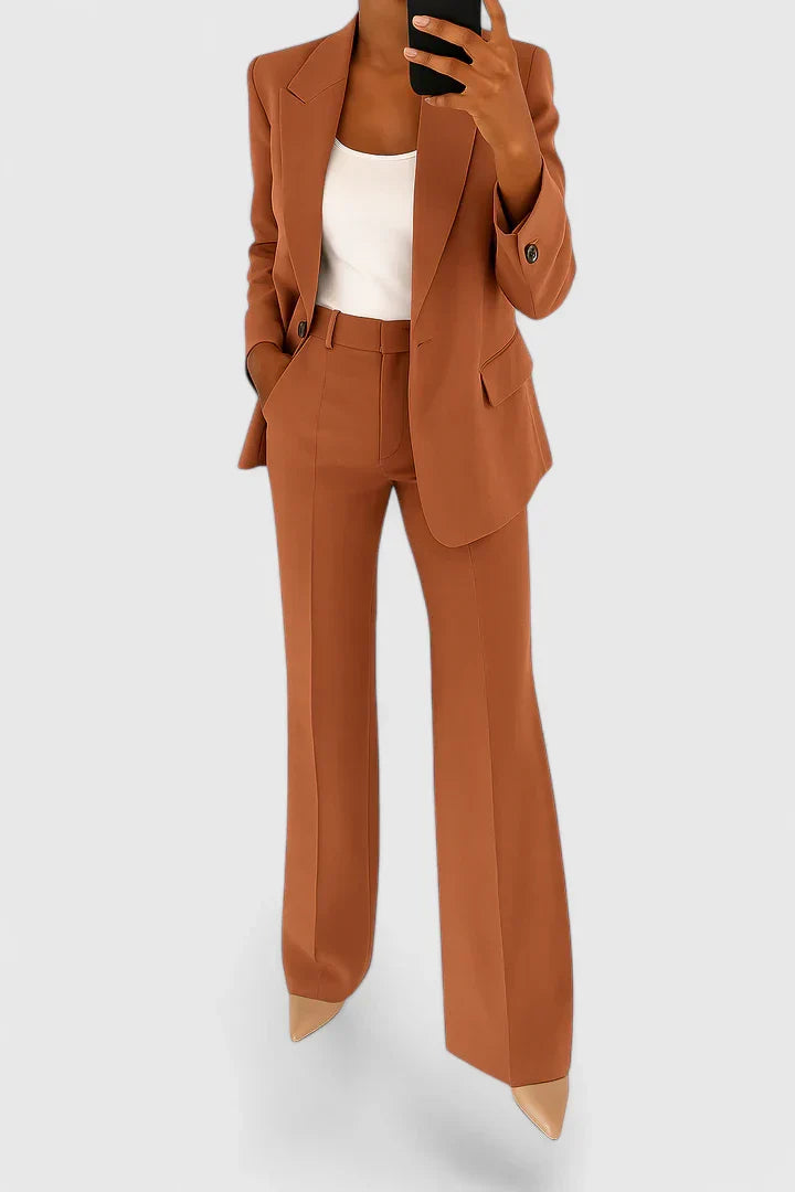Stylish women's two-piece suit set for a modern professional look, perfect as business or formal attire.