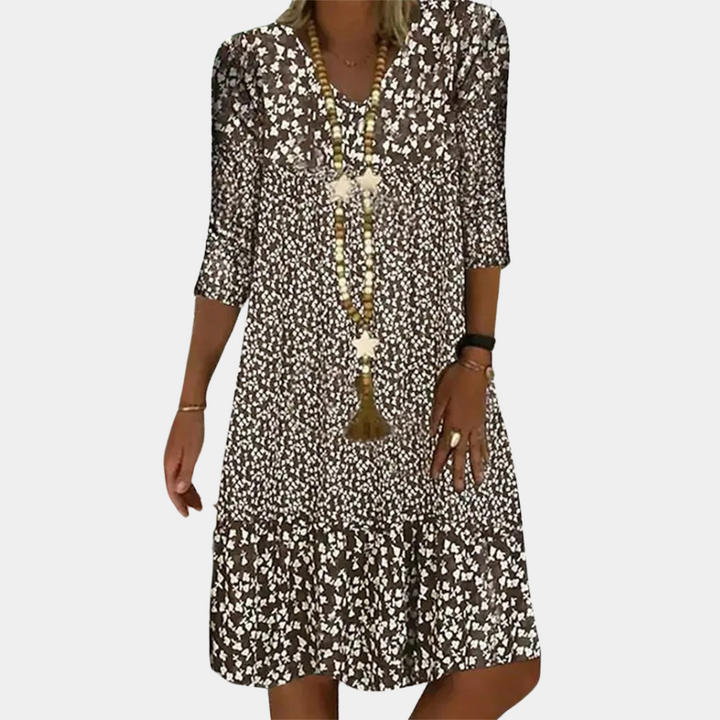 Casual yet elegant flowy midi V-neck dress for women. Perfect short-sleeve summer apparel for vacation & everyday fashion.