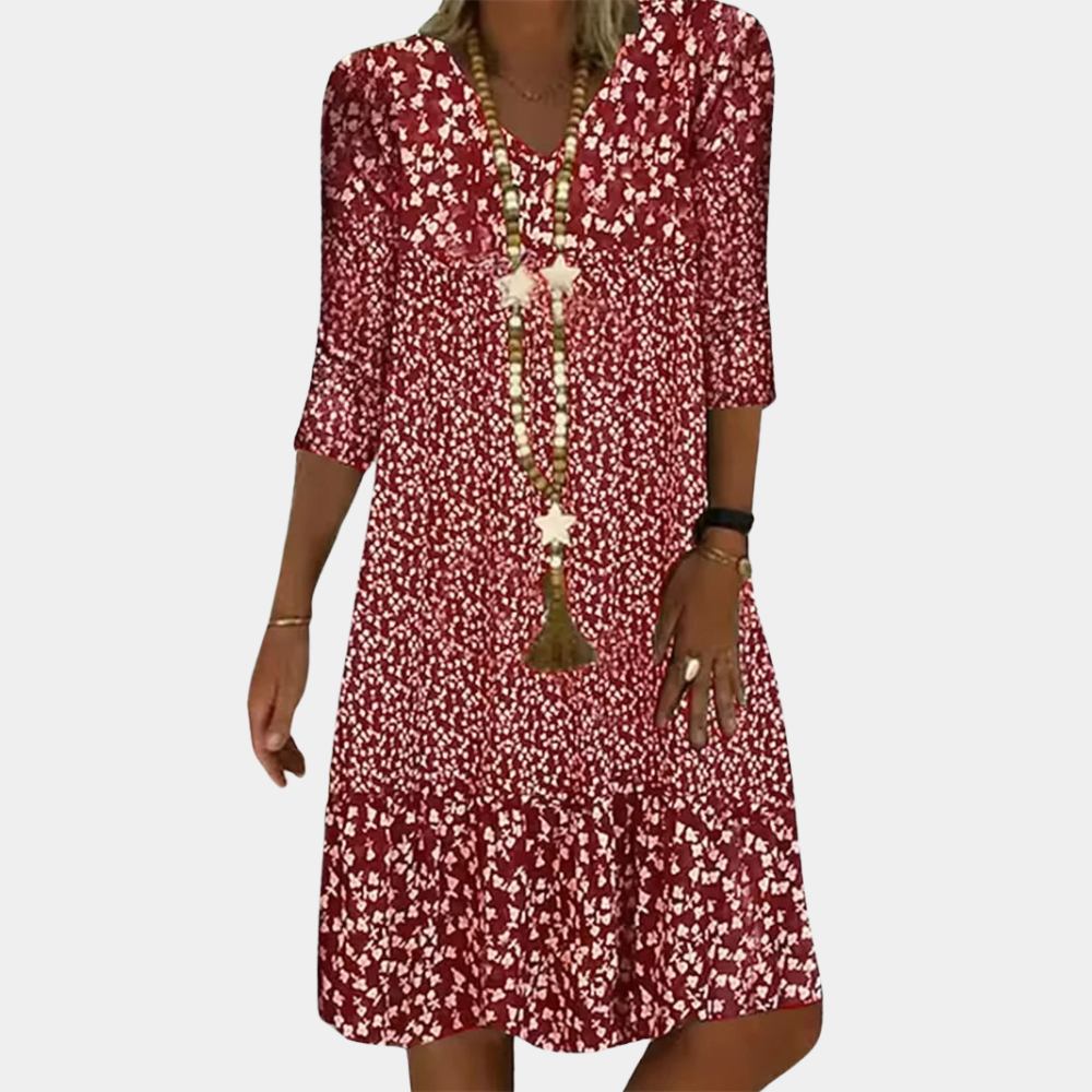 Ladies' versatile V-neck midi summer dress. Elegant short-sleeve flowy design, great for casual outings or vacation wear.