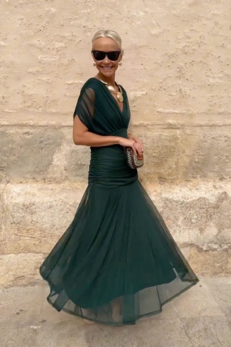 Elegant chiffon-style V-neck pleated maxi dress, perfect for formal evening parties.
