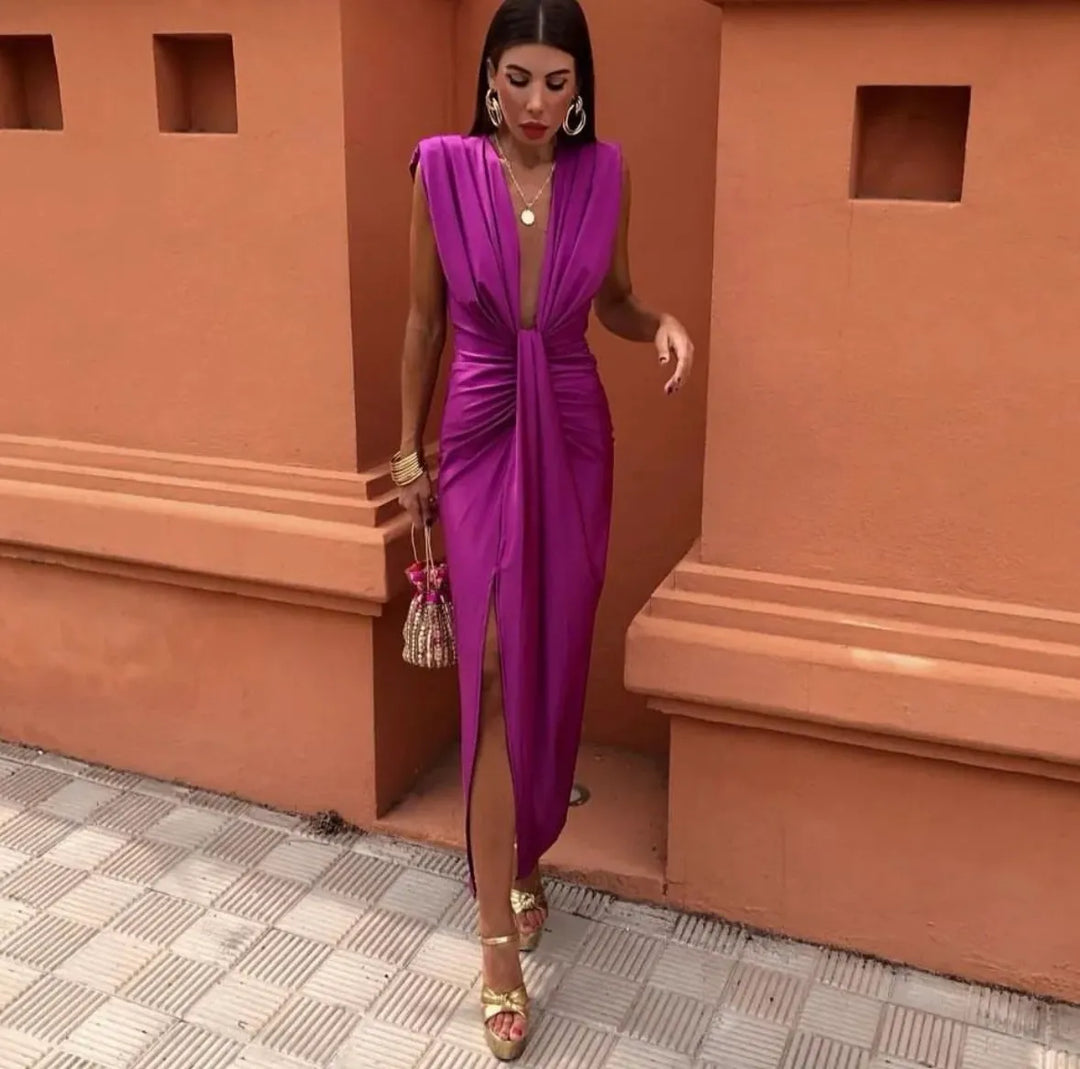 Vibrant long women's V-neck maxi dress with chic twist front, ideal for wedding guests and formal events.