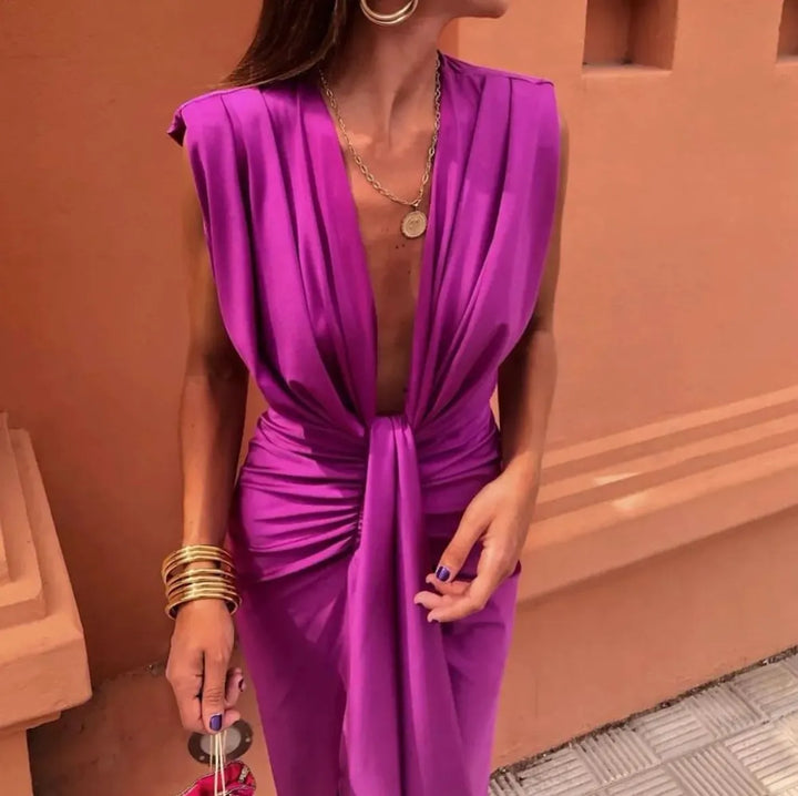 Beautiful women's long V-neck twist front wedding guest dress, featuring an elegant draped design.