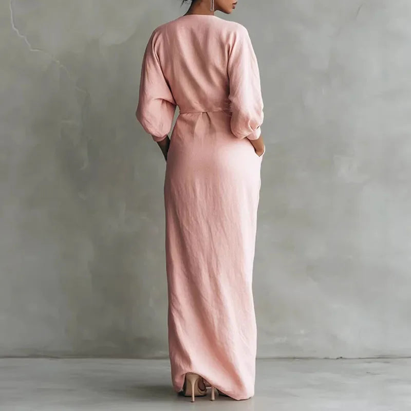 Sophisticated pink V-neck wrap long dress for women, a stylish bodycon design for formal or casual wear.