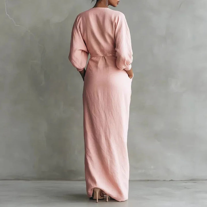 Sophisticated pink V-neck wrap long dress for women, a stylish bodycon design for formal or casual wear.