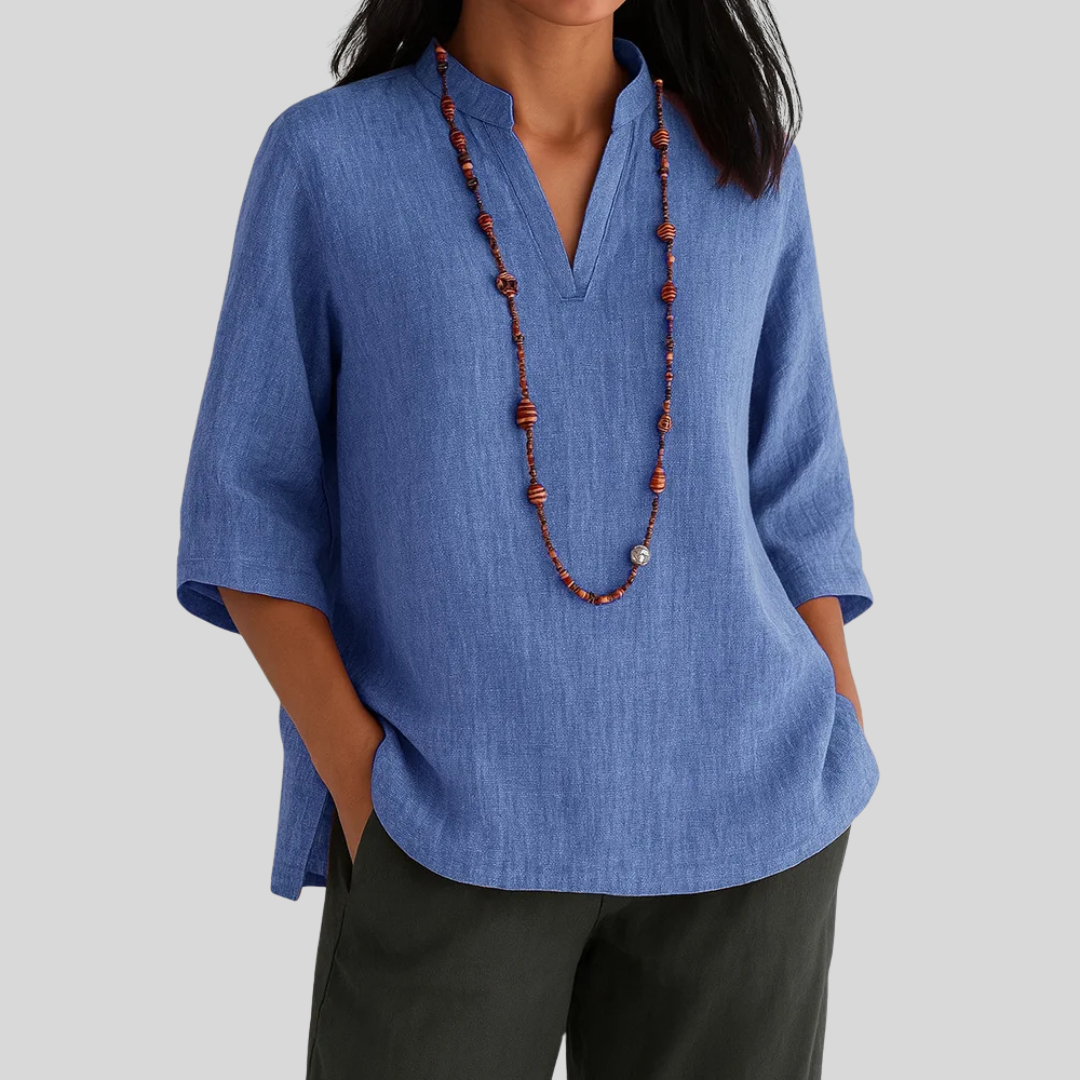 Casual women's 3/4 sleeve v-notch blouse. A versatile textured shirt for everyday wear and comfortable style.