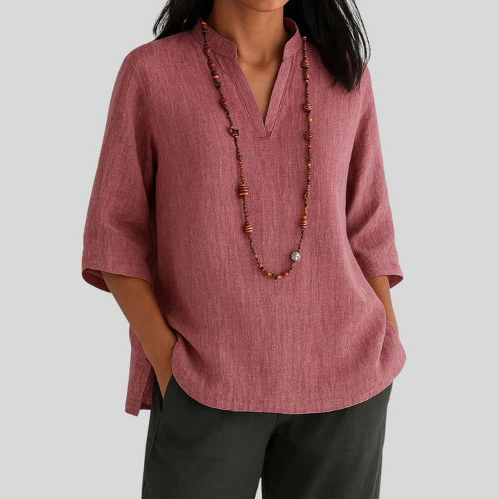 Women's v-notch three-quarter sleeve blouse. Stylish & comfortable textured top for everyday fashion & versatility.