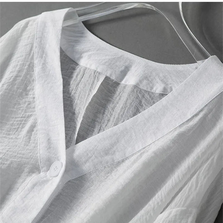White linen blend button-down blouse with chic balloon sleeves for women, a comfortable and fashionable summer top.
