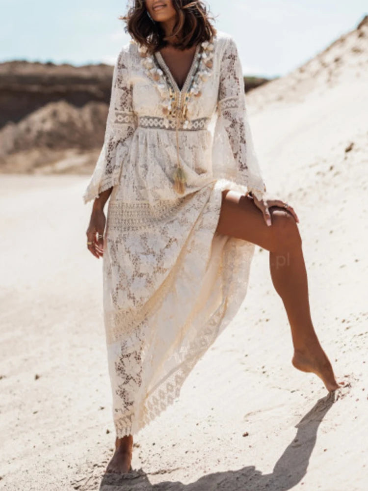 Chic women's white V-neck tiered long sleeve maxi dress, an elegant and comfortable versatile piece.