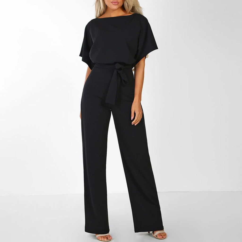 Comfortable women's one-piece wide leg belted jumpsuit. Versatile and elegant for casual wear or chic spring/summer outfits.