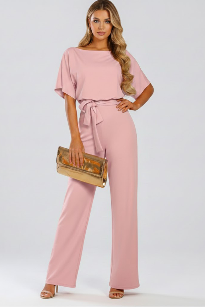Elegant women's wide-leg jumpsuit with a sophisticated waist tie, perfect for a chic & comfortable look.