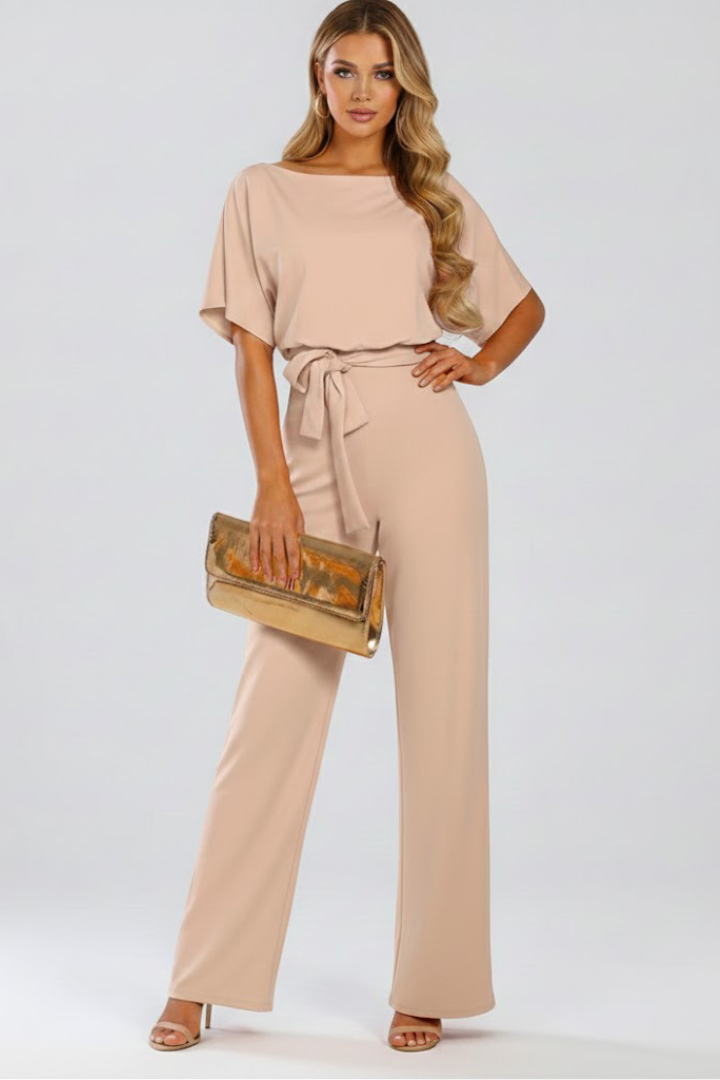 Comfortable & stylish women's wide-leg jumpsuit with a flattering waist tie, ideal for versatile spring outfits.