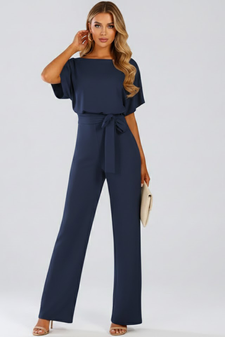 Flattering women's elegant wide-leg jumpsuit featuring a stylish waist tie for a defined silhouette.