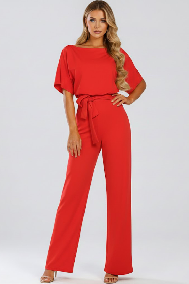 Effortlessly chic women's wide-leg jumpsuit with a comfortable fit & adjustable waist tie, great for any day.
