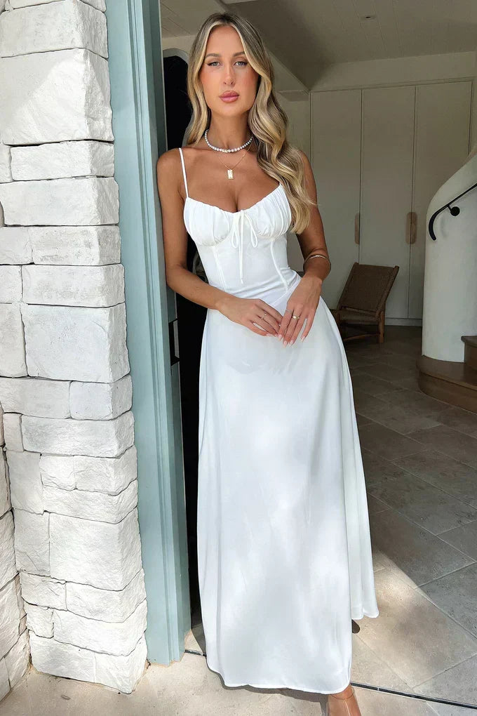 Sophisticated women's evening wrap maxi dress, ideal as a formal wedding guest attire.