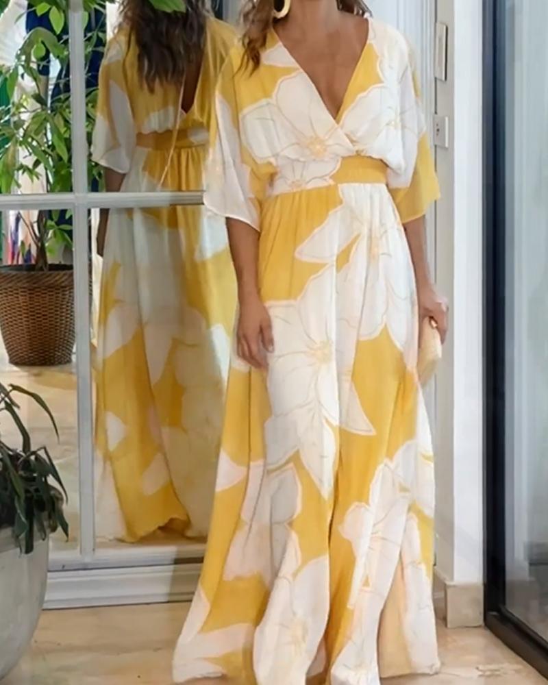 Elegant women's yellow floral maxi dress with flutter sleeves & V-neck, perfect for summer vacations & resort wear.
