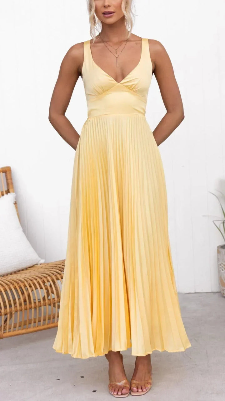 Women's sunny yellow pleated maxi dress with a flattering V-neckline, full length