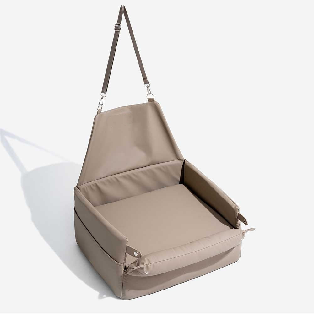 Faux leather dog car seat booster bed, a luxurious and safe vehicle pet bed for comfortable small dog travel.