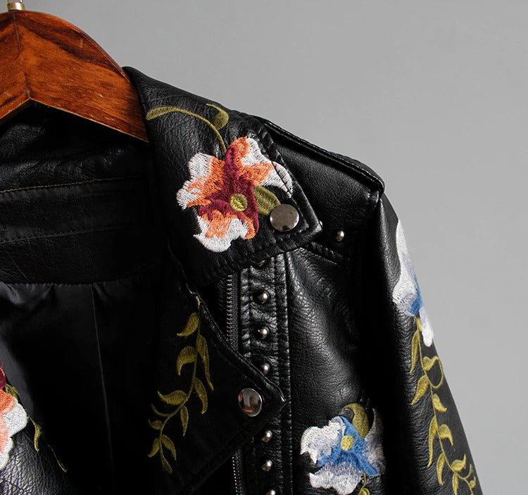 Edgy women's faux leather biker jacket, "Eleonora," with striking floral embroidery.