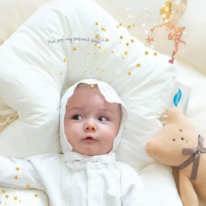 "Ergonomic infant support pillow with adjustable sides, recessed head zone for comfort and alignment, soft exterior, baby-saf