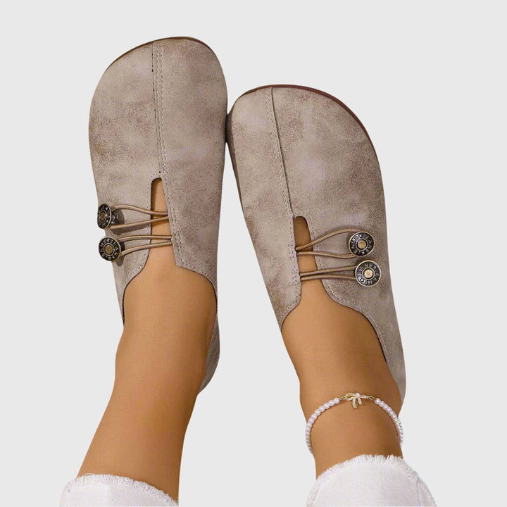 Side profile of Evelyn button-detail flats, slip-on casual women's shoes, comfortable everyday flats, sizes 5-12