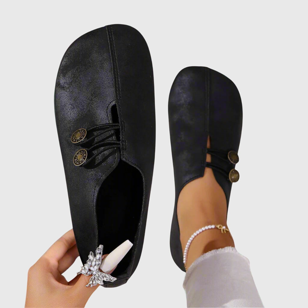 Evelyn flats on foot styled with jeans, neutral slip-on casual shoes, comfortable women's flats for everyday wear