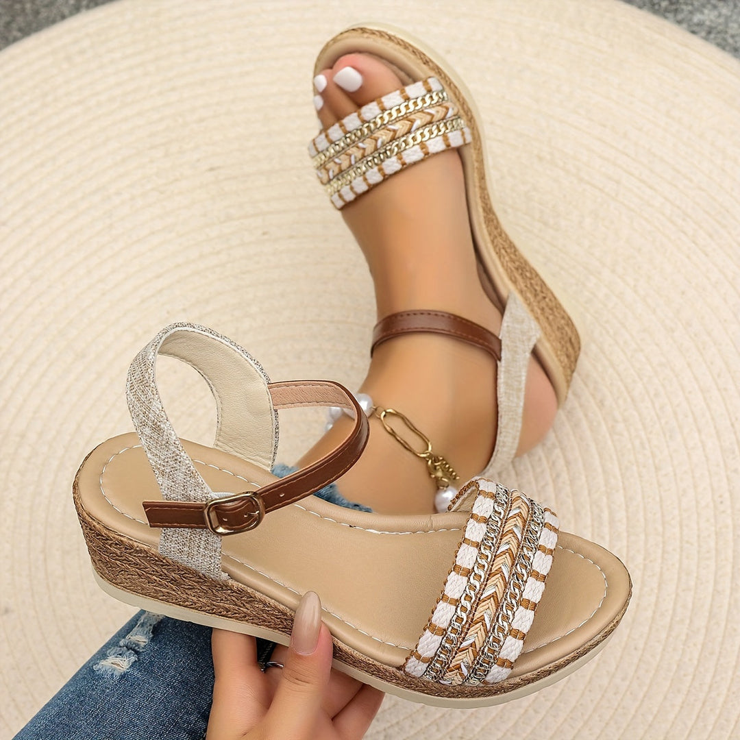 Elegant women's heeled sandals featuring a cushioned orthopedic wedge & secure crossed straps.