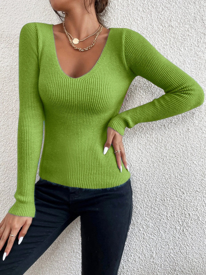 Elegant women's fine knit V-neck jumper, slim fit, perfect for versatile all-season casual chic style.